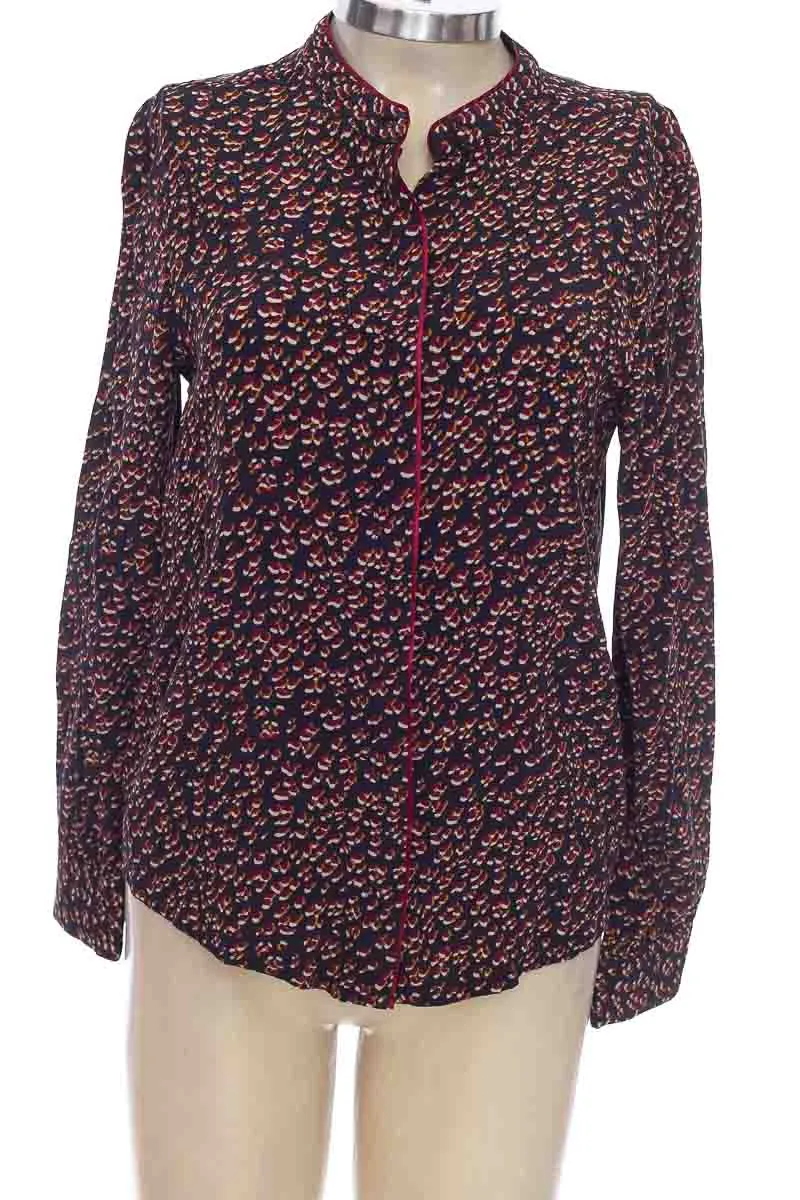 BLUSA COLOR AZUL  CHEVIGNON