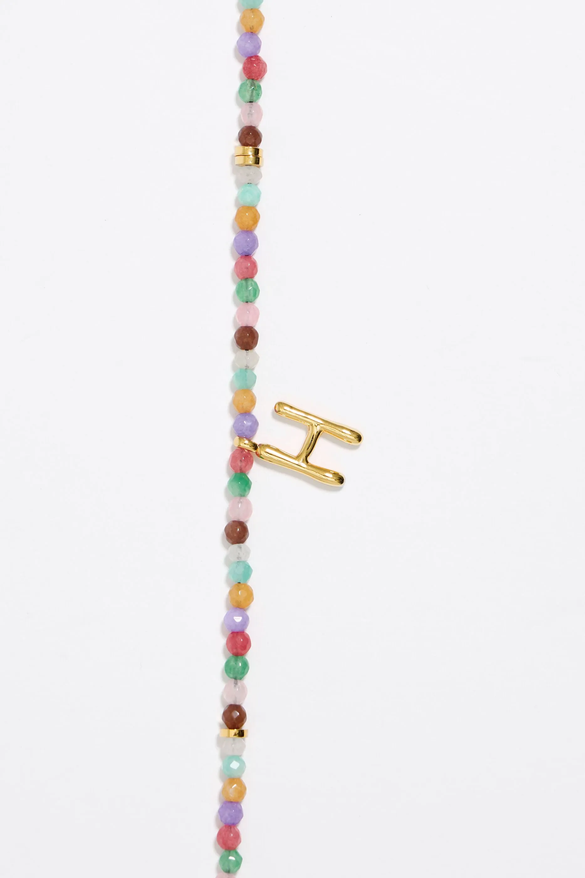 Collar letra H piedras multicolores