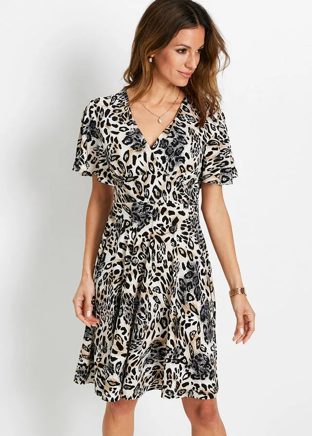 Vestido de algodón crema con estampado de leopardo
